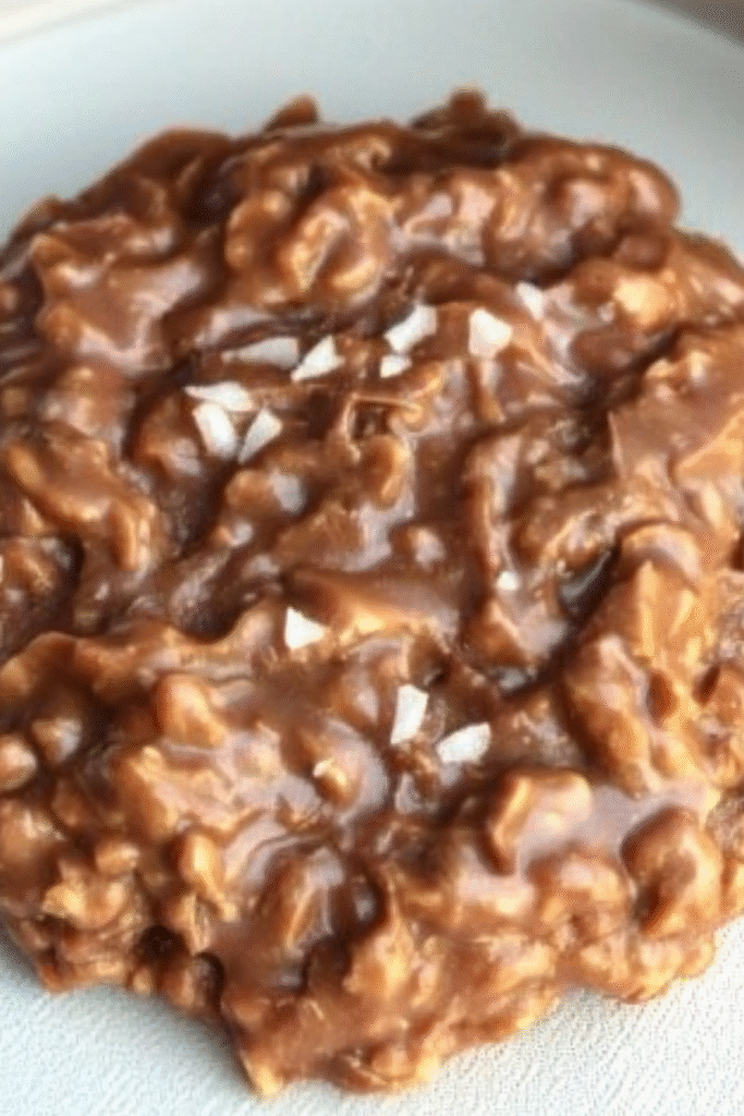 Golden keto cookies made with almond flour arranged on a cooling rack, showing their perfectly crisp edges and tender centers
